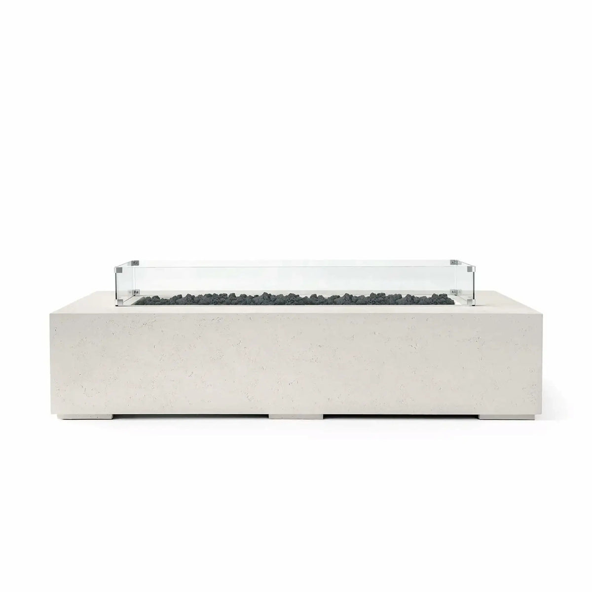 HPC Fire Hearth Products Controls Dekko GFRC Concrete Sonoma 72 x 33 Fire Pit in Limestone finish featuring black lava rock fire media and a clear tempered glass wind guard. This rectangular outdoor fire pit table showcases durable GFRC concrete construction, clean architectural lines, and a contemporary low-profile design ideal for patios, rooftop terraces, luxury outdoor lounges, and modern backyard living spaces.