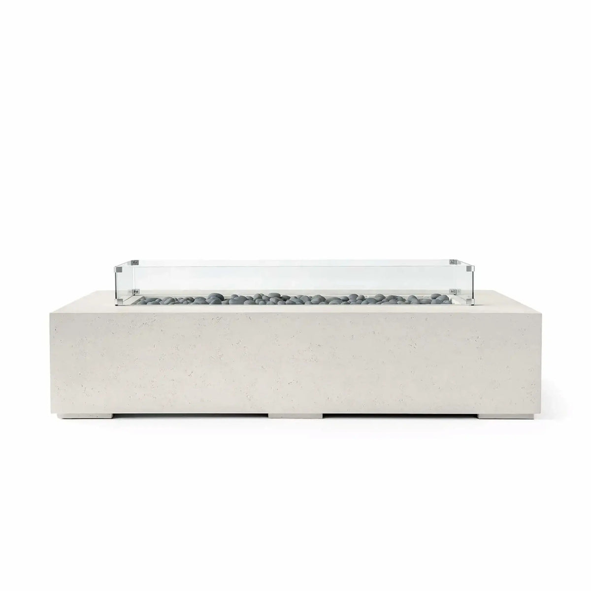 HPC Fire Hearth Products Controls Dekko GFRC Concrete Sonoma 72 x 33 Fire Pit in Limestone finish with smooth gray slate stone fire media and a tempered glass wind guard. The elongated rectangular design combines modern aesthetics with durable concrete construction, creating an elegant outdoor centerpiece for contemporary patios, poolside seating areas, and upscale entertainment spaces.