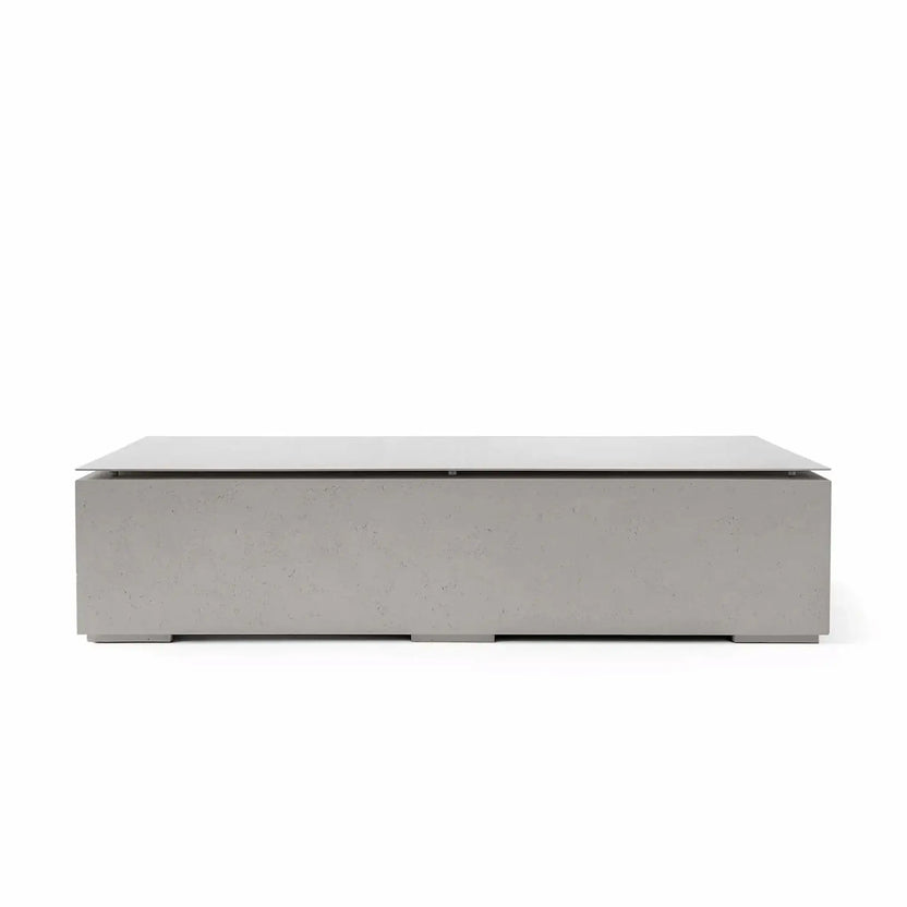 HPC Fire & Hearth Products Controls Dekko GFRC Concrete Sonoma 72 x 33 Fire Pit Sandstone Table Top Lid displayed in a light sandstone concrete finish. The rectangular fire pit features a matching tabletop lid that conceals the burner compartment and provides additional functionality when not in use. Clean lines, durable GFRC concrete construction, and a neutral finish make it a versatile addition to modern outdoor spaces.