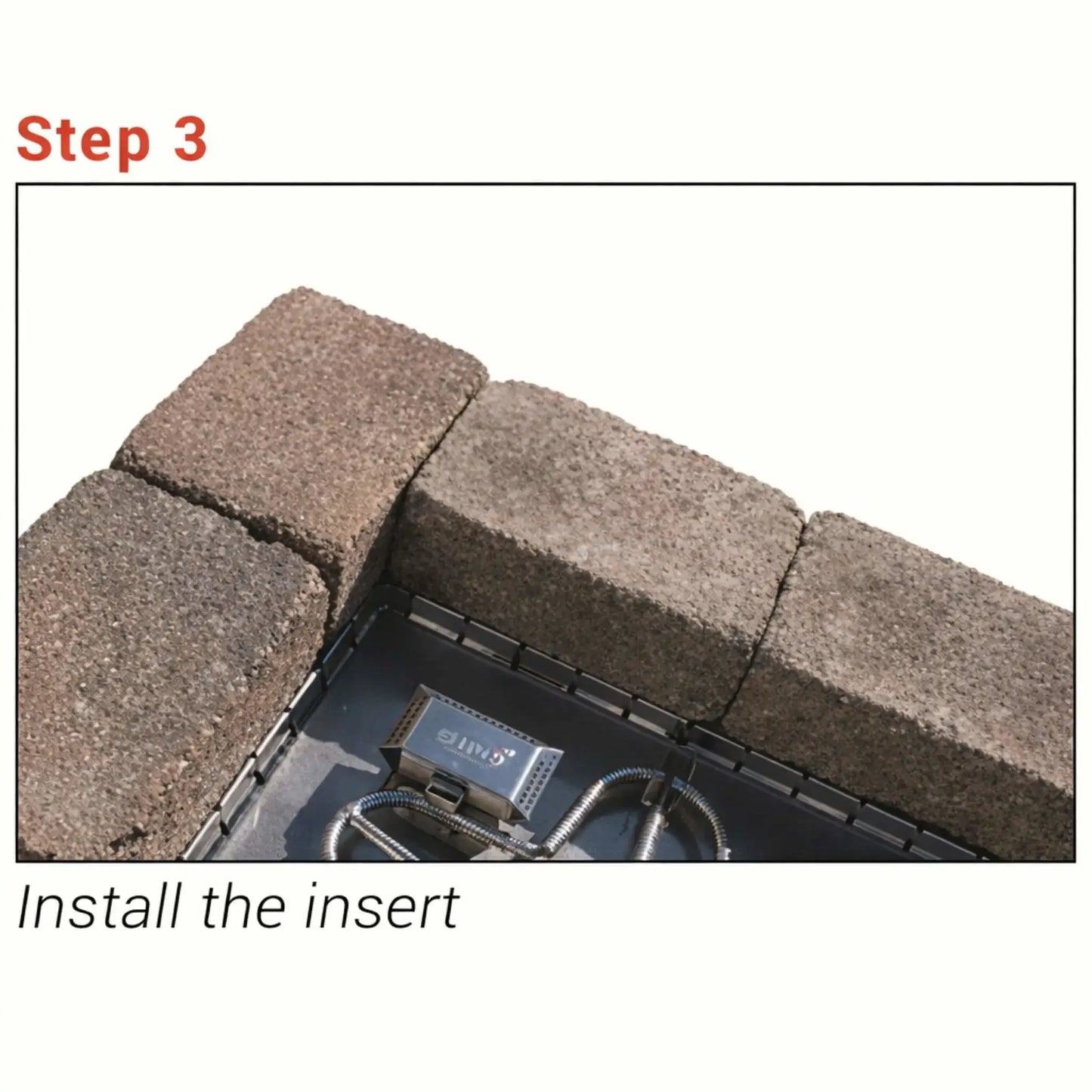 Step 3 installation image showing a fire pit insert and ignition system placed inside the enclosure, resting on the installed stainless steel flex form collar. The collar creates a clean, level support surface beneath the insert, ensuring proper alignment and stability within the fire pit.