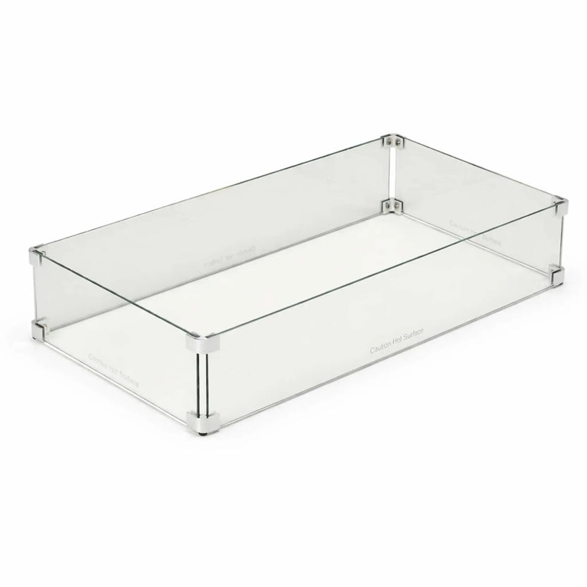 Rectangular tempered glass wind guard for fire pit tables displayed on a clean white background, showing clear panels, polished edges, and metal corner connectors designed to protect flames from wind.