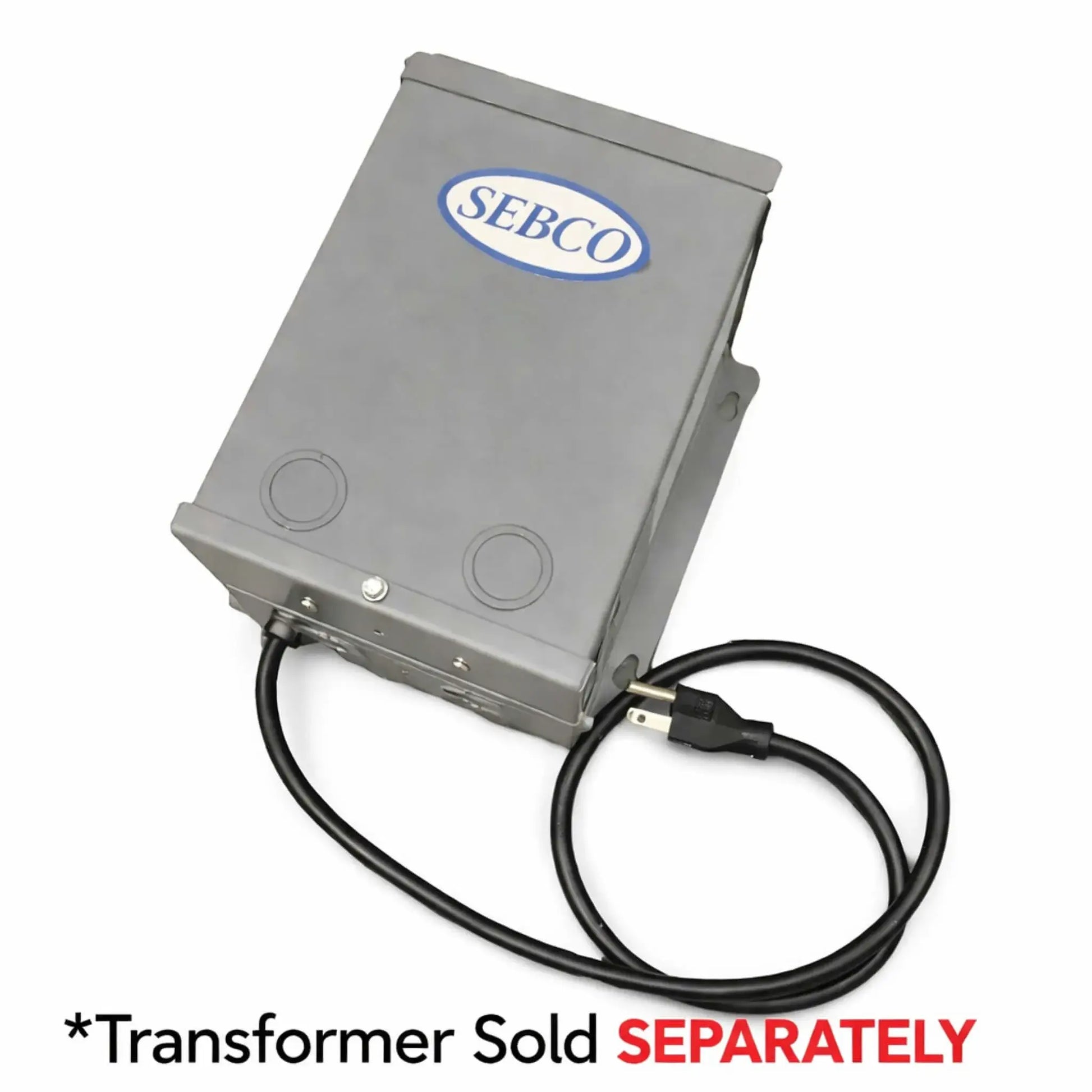 Compact SEBCO metal transformer box with attached power cord, used for supplying 12V or 24V power to fire pit ignition systems. The unit features a durable gray enclosure with mounting points, indicating it is sold separately for use with electronic ignition setups.