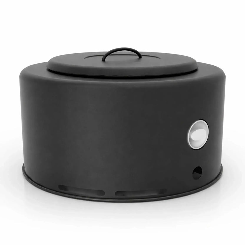 Clean product shot of the HPC Portable Sport Pit Tailgate Fire on a white background, featuring a matte black cylindrical body with lid and side ignition control. The image highlights the compact, portable design and ventilation slots around the base for propane fire pit performance.
