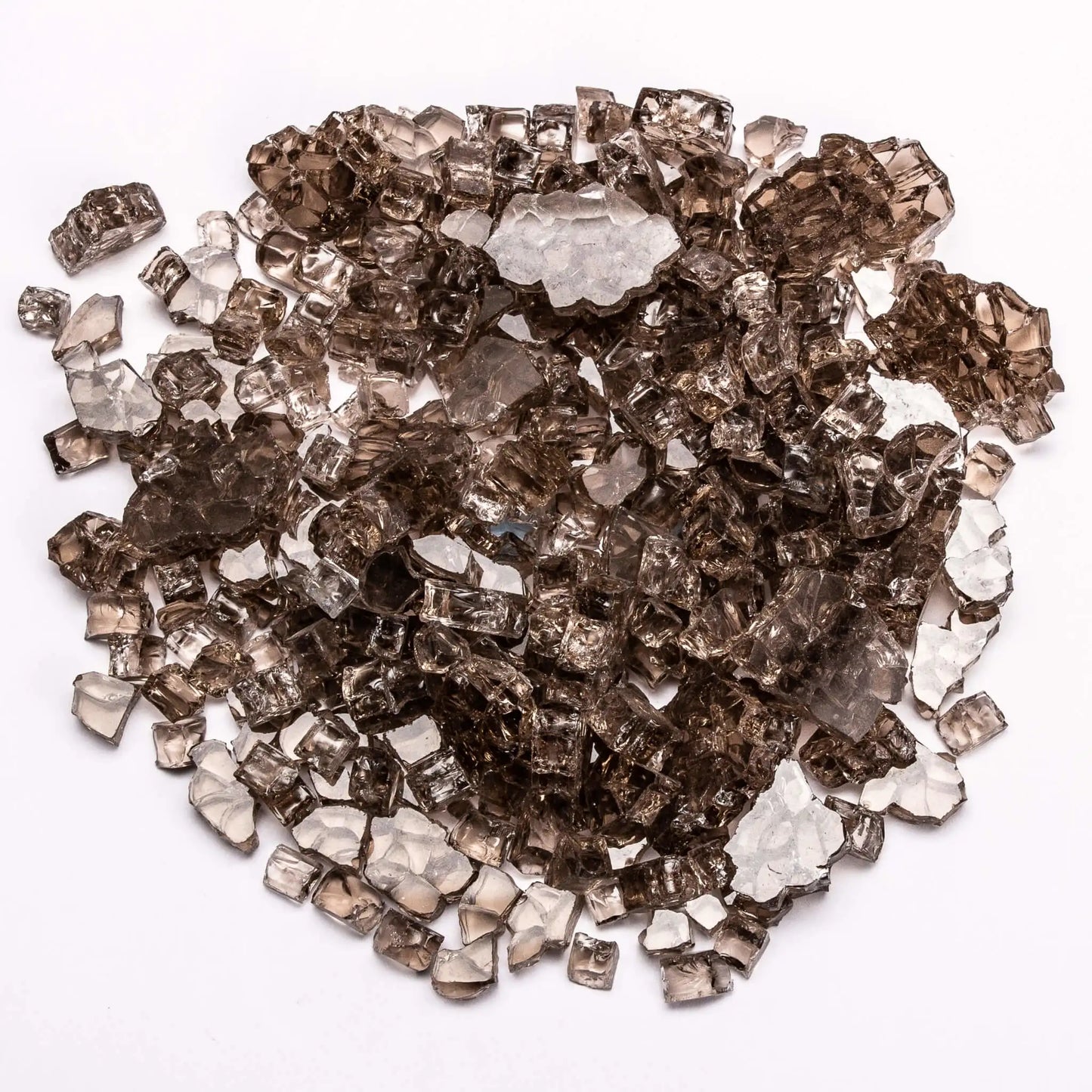 A pile of bronze-colored tempered fire glass with warm, smoky tones displayed on a white surface. The translucent pieces catch light subtly, creating depth and richness, making it a popular choice for adding a cozy, upscale feel to fire features.