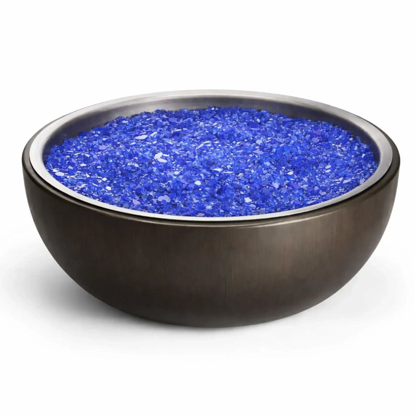 HPC Fire Inspired Hearth Products walnut finish aluminum spun bowl filled with blue fire glass, showcasing a darker wood-toned exterior paired with vibrant fire media for a contemporary outdoor fire pit aesthetic.