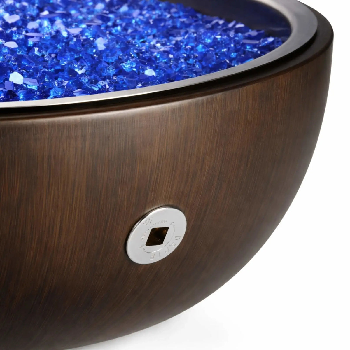 HPC Fire Inspired Hearth Products aluminum spun bowl in walnut finish featuring a match lit key valve access port on the side, with blue fire glass visible at the top, highlighting manual ignition control and premium wood-toned fire pit design.