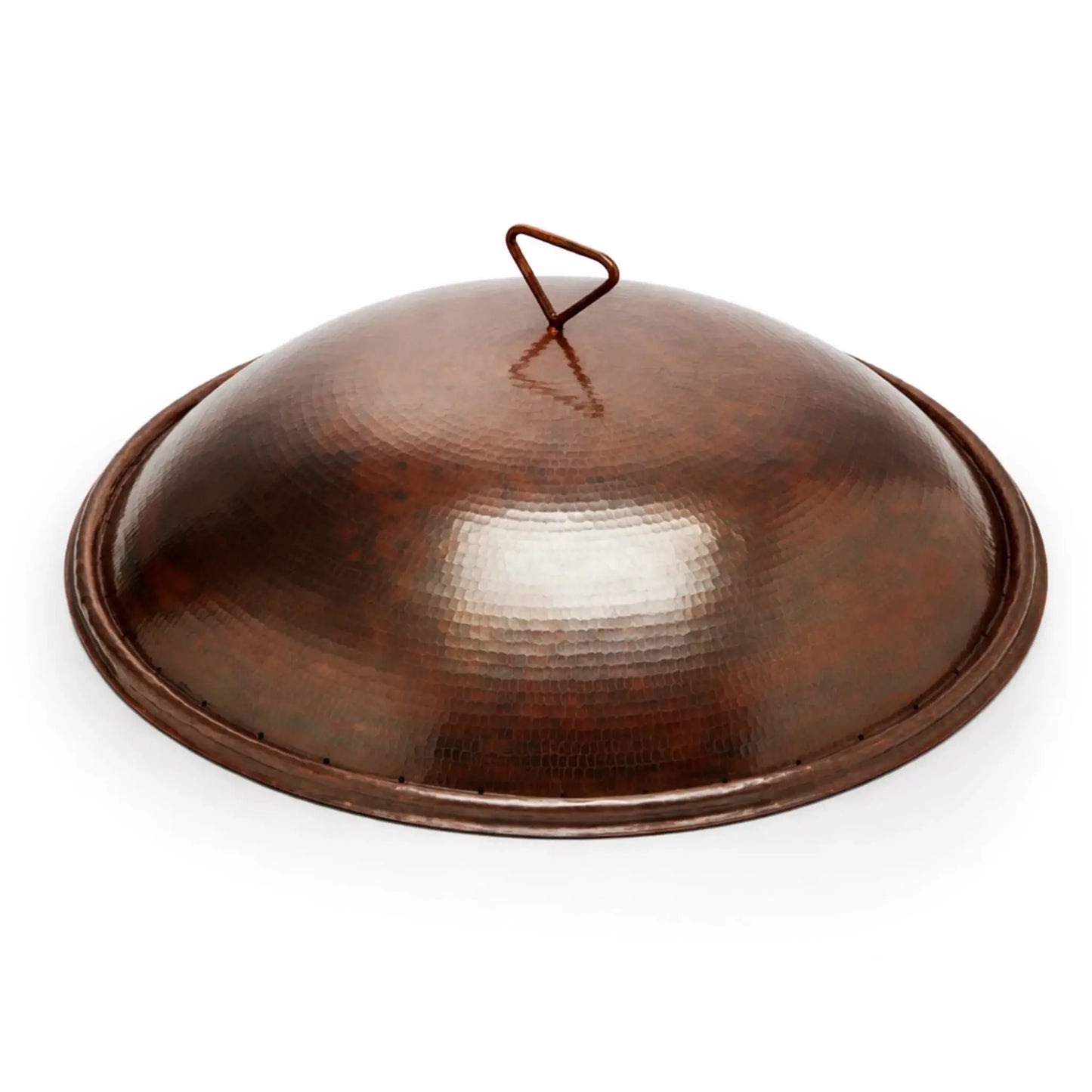 Standalone hammered copper round burner cover for a Tempe fire bowl, showcasing a smooth domed lid with a loop handle and a slightly flared base. The rich copper finish and subtle hammered detailing give it a handcrafted appearance, highlighted against a bright white background for a clean product presentation.