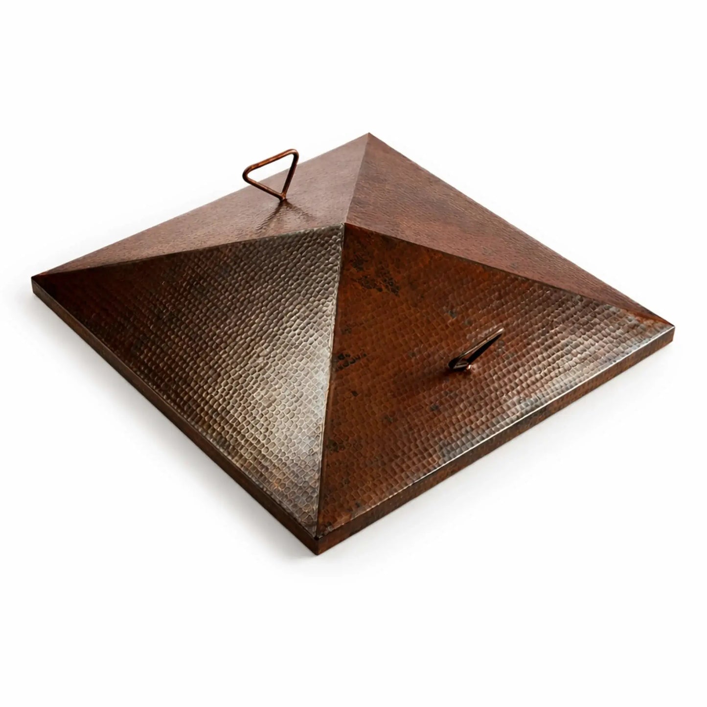 Square hammered copper burner cover with a pyramid lid and dual handles, designed for a Sedona fire bowl. The clean lines and angular shape contrast with the warm copper tones and textured surface. Displayed on a white background to highlight the craftsmanship and architectural style of the cover.