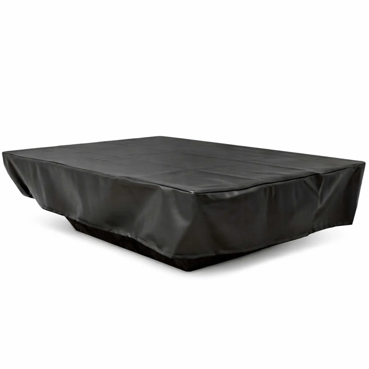 Black rectangular vinyl fire pit cover shown at an angled perspective on a clean white background, designed to protect a large outdoor fire pit or table. The cover features a smooth, slightly matte finish with natural creases and folds along the top surface and draped sides. Reinforced seams and tailored edges create a snug fit, while the extended skirt provides full coverage down to the base, indicating durable, weather-resistant construction for outdoor use.