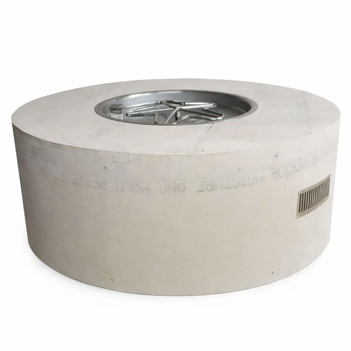 Studio product image of a round ready-to-finish fire pit table enclosure made from cement board, featuring a recessed stainless steel burner pan with a star-shaped burner. The cylindrical structure includes a smooth unfinished exterior and a built-in side vent, designed for custom finishing in outdoor patio or backyard fire feature installations.