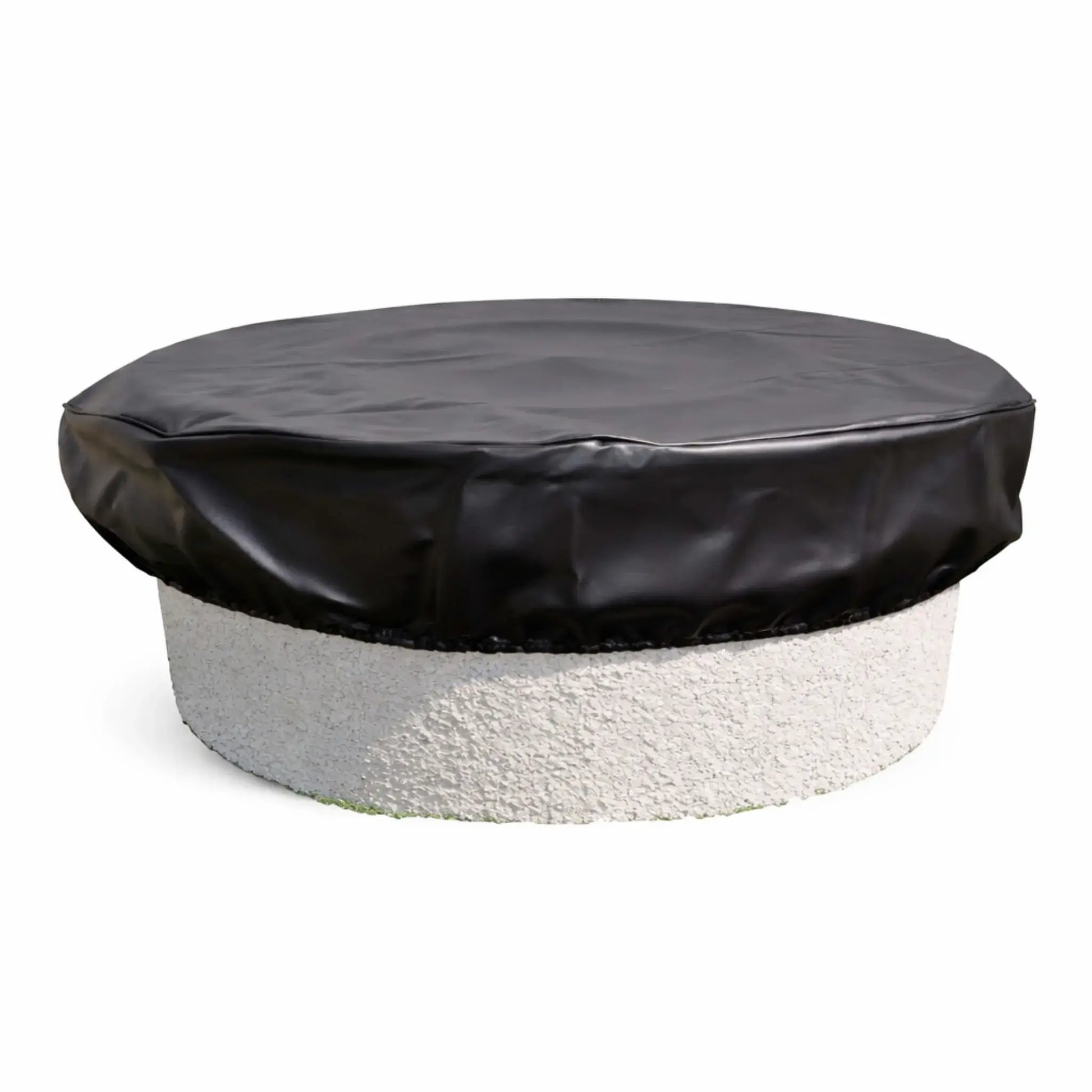 Round black vinyl fire pit cover fitted over a circular outdoor fire feature with a textured, light-colored stone base, shown on a clean white background. The cover has a smooth, slightly glossy surface with visible creases and natural folds, wrapping securely around the top edge. An elastic or gathered hem creates a snug fit, helping protect the fire pit from weather, debris, and sun exposure while maintaining a clean, low-profile appearance.