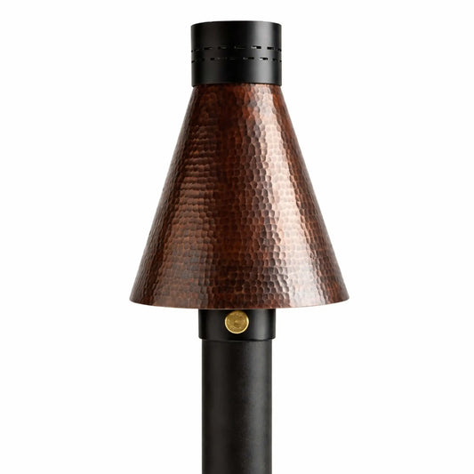 HPC TK Torch Copper Head and Post in a studio setting, showcasing a hammered copper torch head with rich texture mounted on a black post, combining rustic aesthetics with modern gas torch functionality for outdoor fire features.