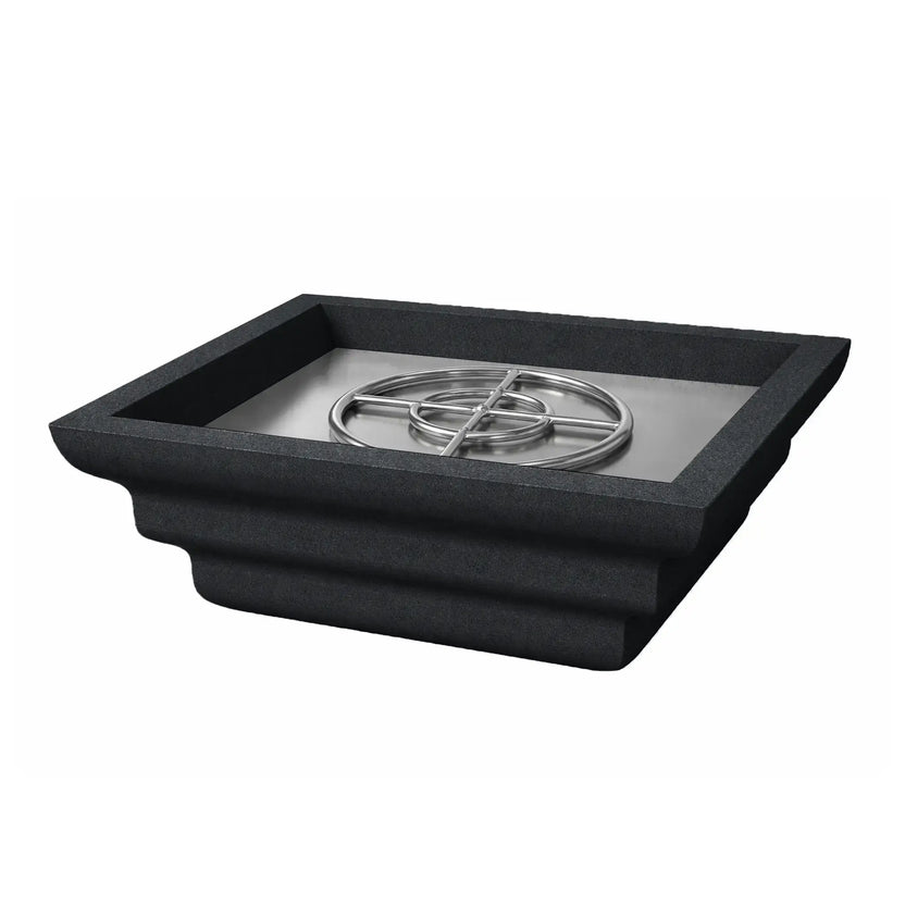 Angled product view of the black Shadow Cast Ripple Designer Series square fire bowl by Flame Havens. The bowl features a textured graphite finish with layered ripple-style sculpting along the sides. The recessed fire chamber reveals a stainless steel circular burner ring mounted on a metal pan, designed for outdoor gas fire pit installations.