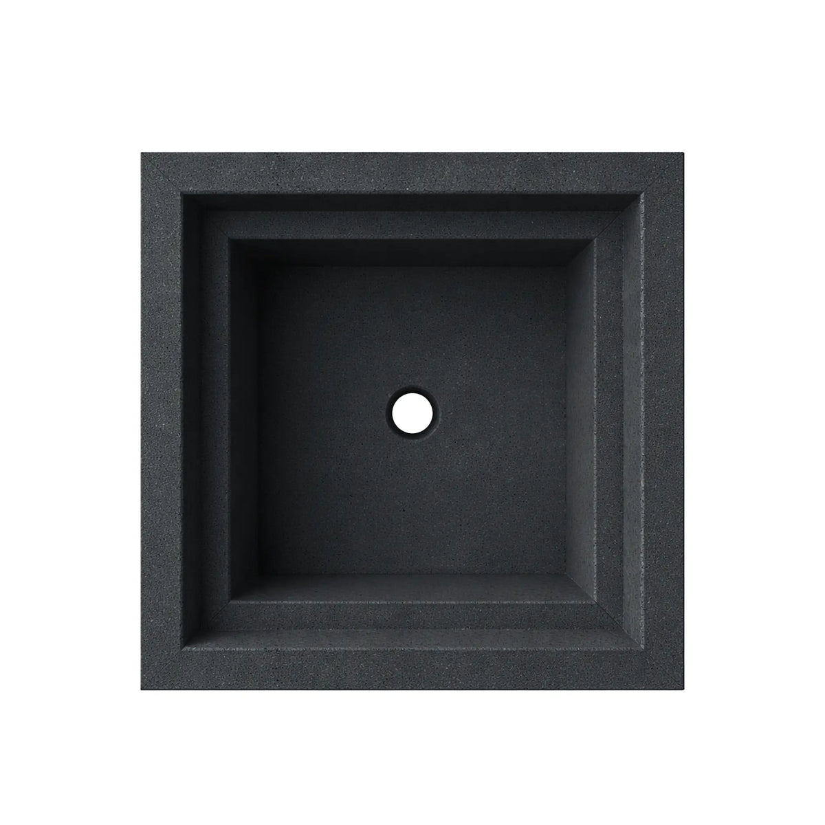 Overhead view of the empty black Shadow Cast Ripple Designer Series fire bowl showing the interior basin without burner components installed. The square fire chamber features a centered gas supply hole for burner installation and a smooth interior surface surrounded by the thick architectural rim of the bowl.