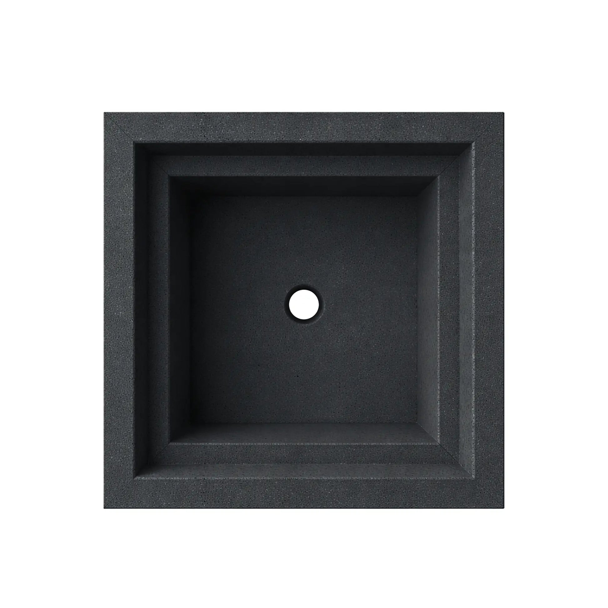 Overhead view of the empty black Shadow Cast Ripple Designer Series fire bowl showing the interior basin without burner components installed. The square fire chamber features a centered gas supply hole for burner installation and a smooth interior surface surrounded by the thick architectural rim of the bowl.