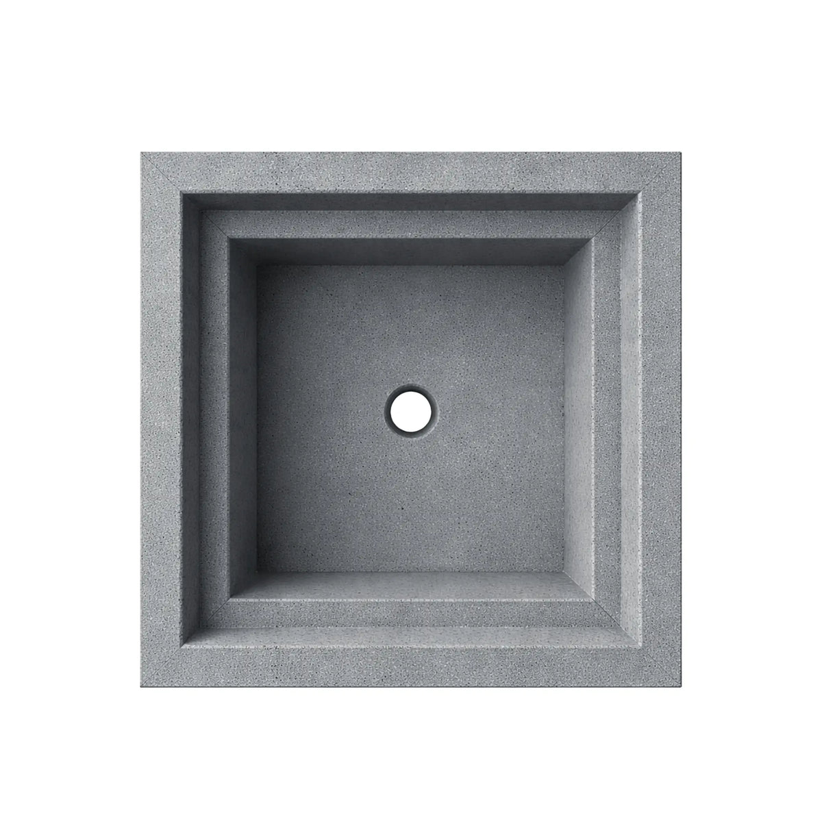 Top-down view of the gray Shadow Cast Ripple Designer Series square fire bowl with an empty interior basin. The recessed square chamber shows a centered circular gas inlet opening for burner installation. The bowl features a textured concrete-style gray finish and stepped inner ledge design, highlighting the clean geometric layout of this outdoor gas fire feature.