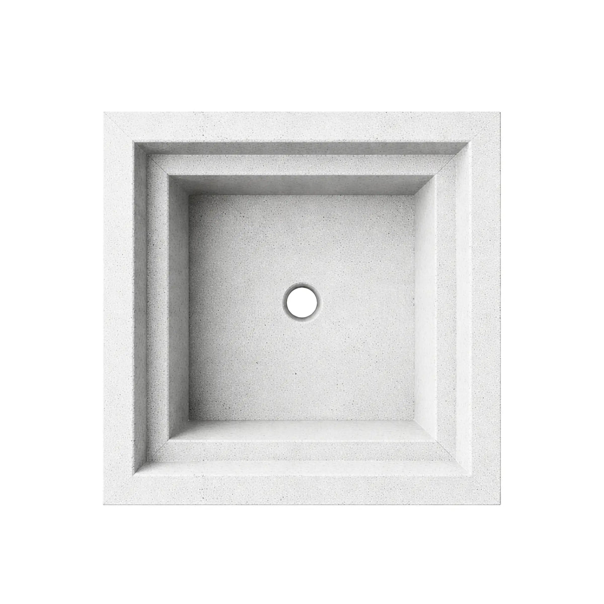 Top view of the white Shadow Cast Ripple Designer Series fire bowl with the basin empty and no burner installed. The recessed square chamber features a centered circular gas inlet hole and stepped interior ledges. The textured white concrete-style finish highlights the clean geometry and architectural form of the fire bowl.