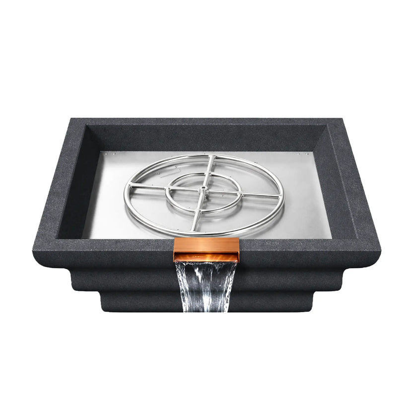 Top interior view of the graphite Shadow Cast Ripple fire and water bowl with the stainless steel burner ring assembly exposed inside a metal burner tray. Water cascades from the copper spillway at the front edge while the empty basin reveals the internal burner structure used for the gas flame system.