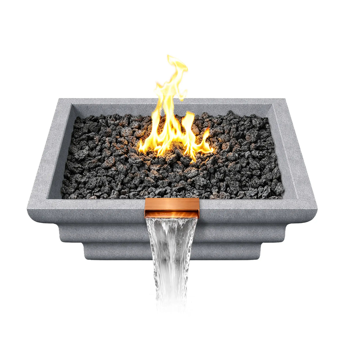 Top-down view of a gray Shadow Cast Ripple Designer Series fire and water bowl filled with black lava rock fire media and a bright gas flame burning at the center. The square GFRC concrete bowl frames the fire feature while water flows from a copper waterfall spillway at the front edge, highlighting the combination fire and water design.